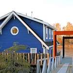Blue Floating Home at Sundown