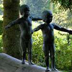 "Continuity" - bronze statues of boy & girl