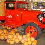 red Coca Cola truck and pumpkins